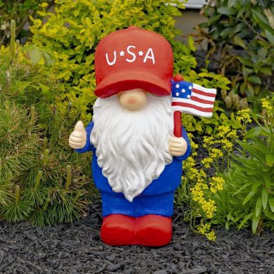 Magnesium Garden Gnome Holding Flag with Red Hat Americanos