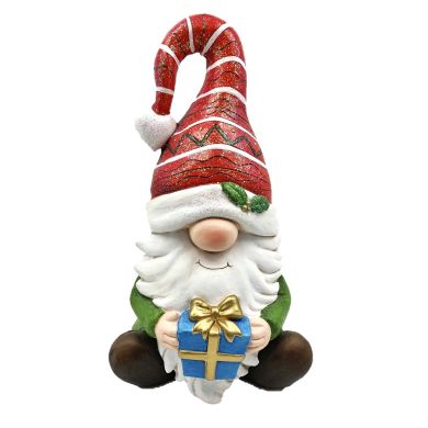 Christmas Gnome Sitting with Gift and Red Striped Hat