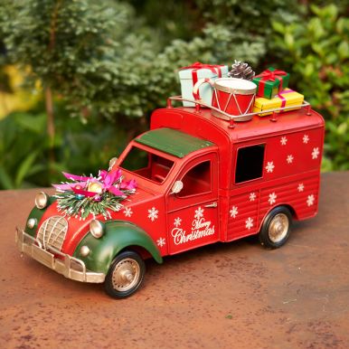 Old-Style Christmas Truck with Snowflakes and Gifts