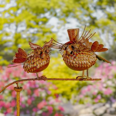 Liven up any outdoor space with the Lesera Bird Buddy Balance Stakes. Each garden stake features varying types of bird couples engaging in different positions. Ranging from 55.5″ to 58.75″ tall, every stake is iron crafted with a rustic hand painted finis